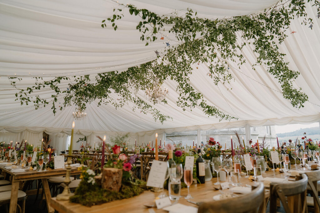 ceiling flower installation wedding