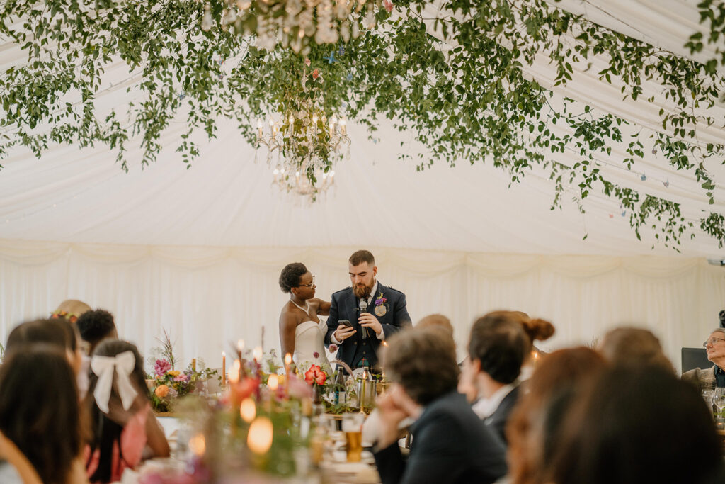 ceiling flower installation wedding